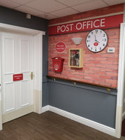 Wallpaper Mural of a Post Office designed for dementia care home with a themed memory box , clock and posting box